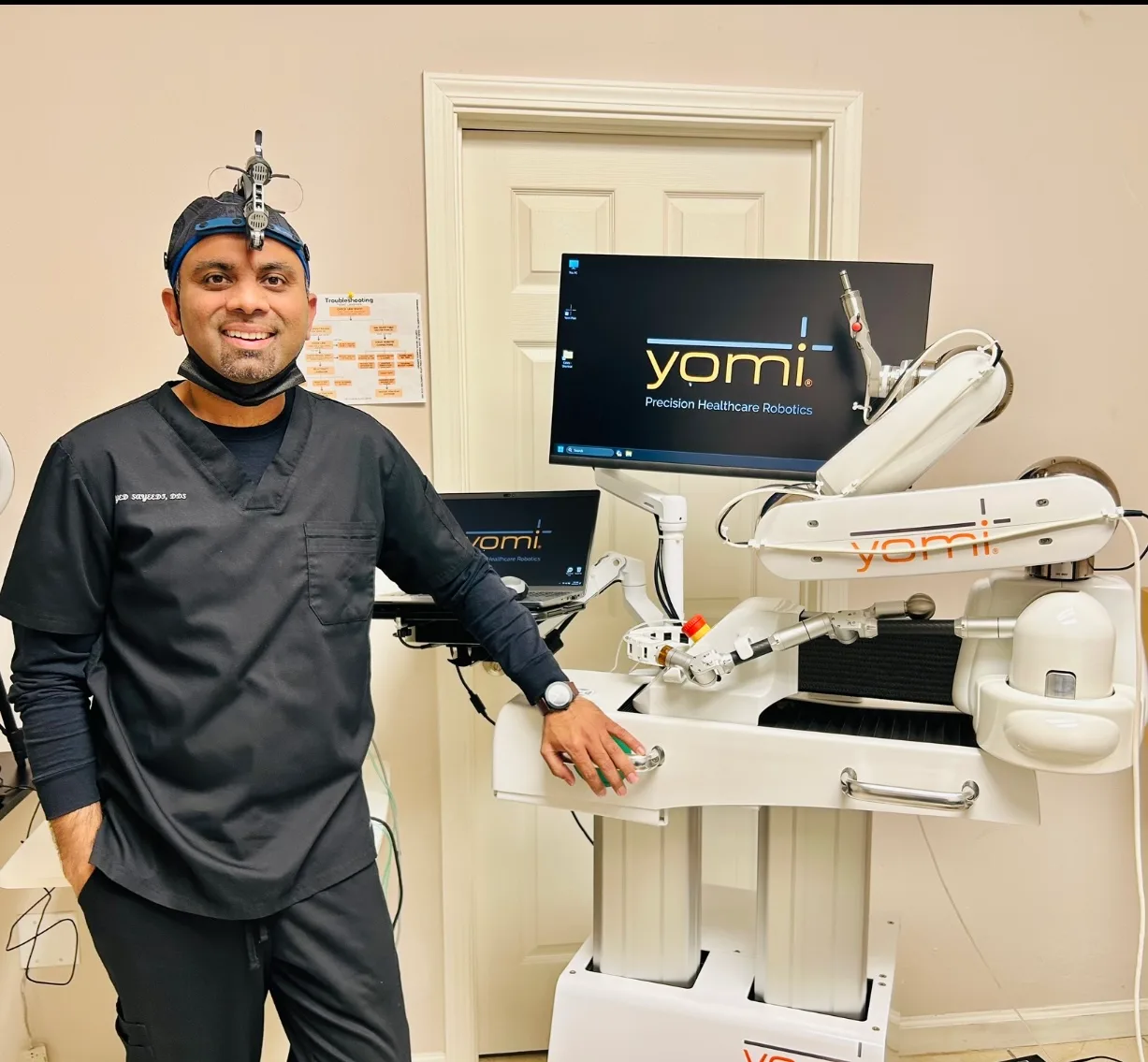 Dr. Sayeedi with the Yomi robotic dental implant system