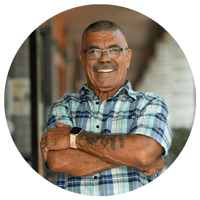 patient smiling after getting dental implants